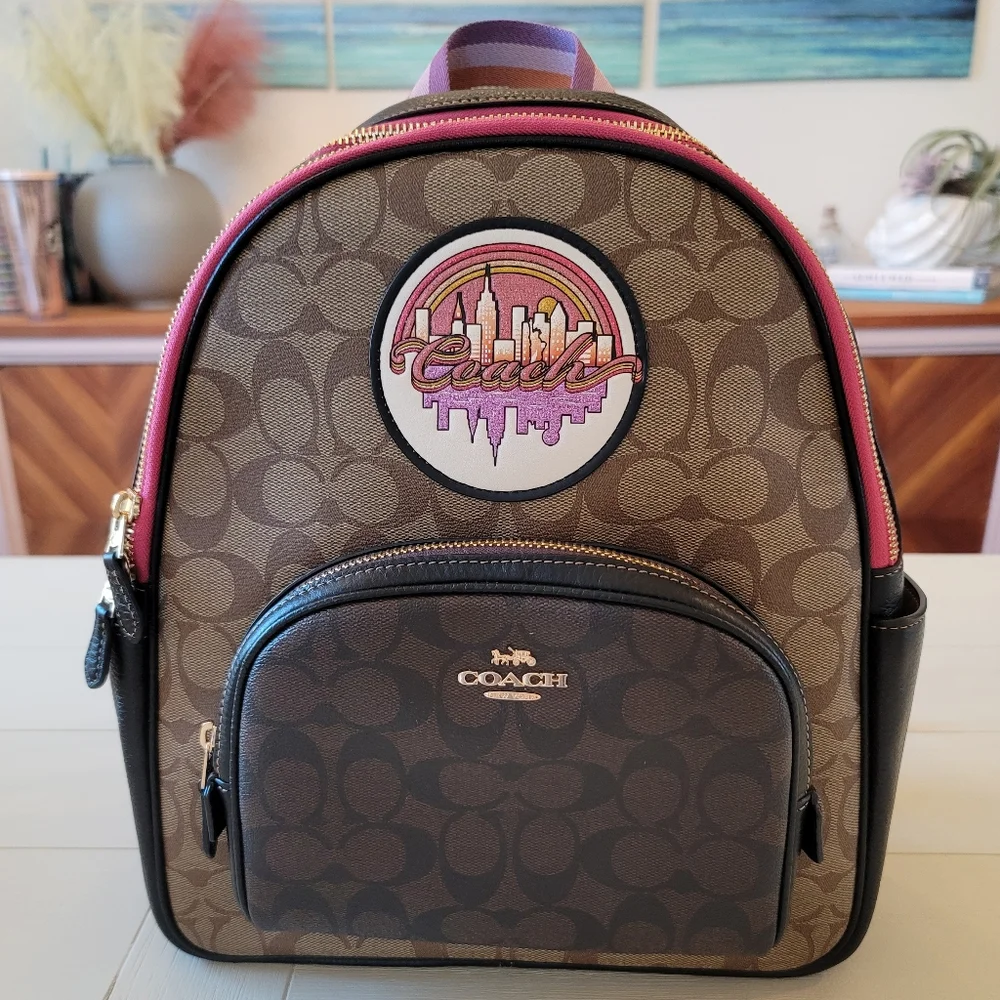 Coach Signature Brown Tan Backpack with Pink Trim and Purple Accent